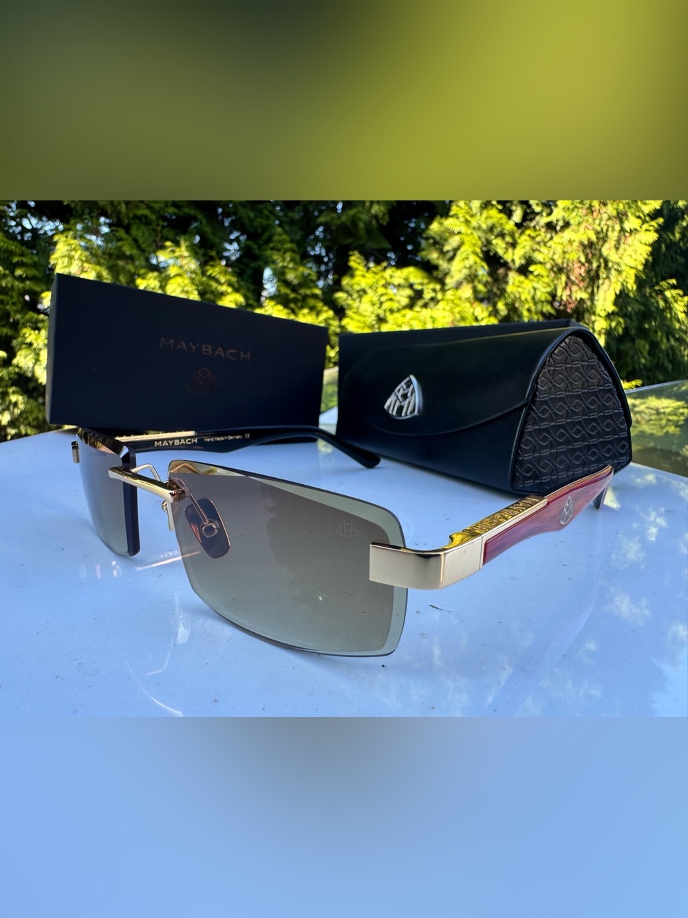 Maybach Rimless Sunglasses in Black and Gold with Red Temples